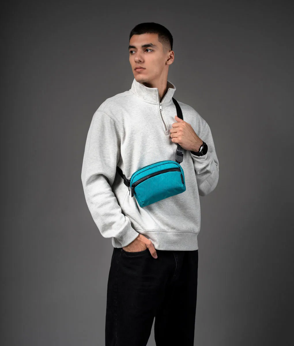 Alpaka Flight Sling skuldertaske 1L teal