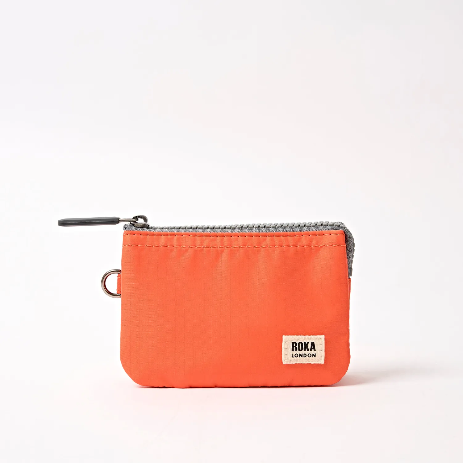 Roka London Carnaby Tangerine pung Small 0,2 liter nylon