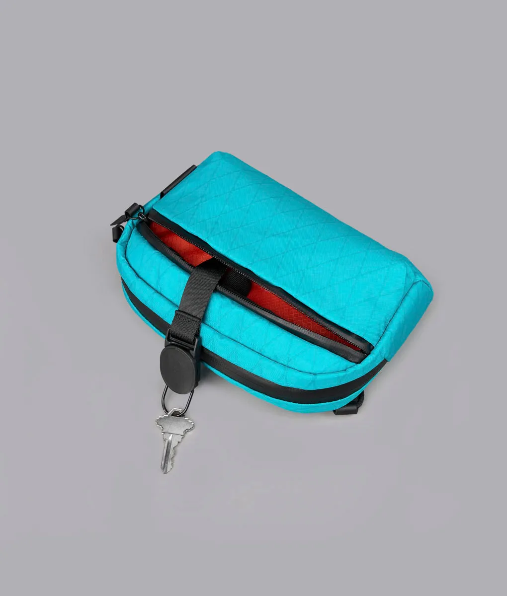 Alpaka Flight Sling skuldertaske 1L teal