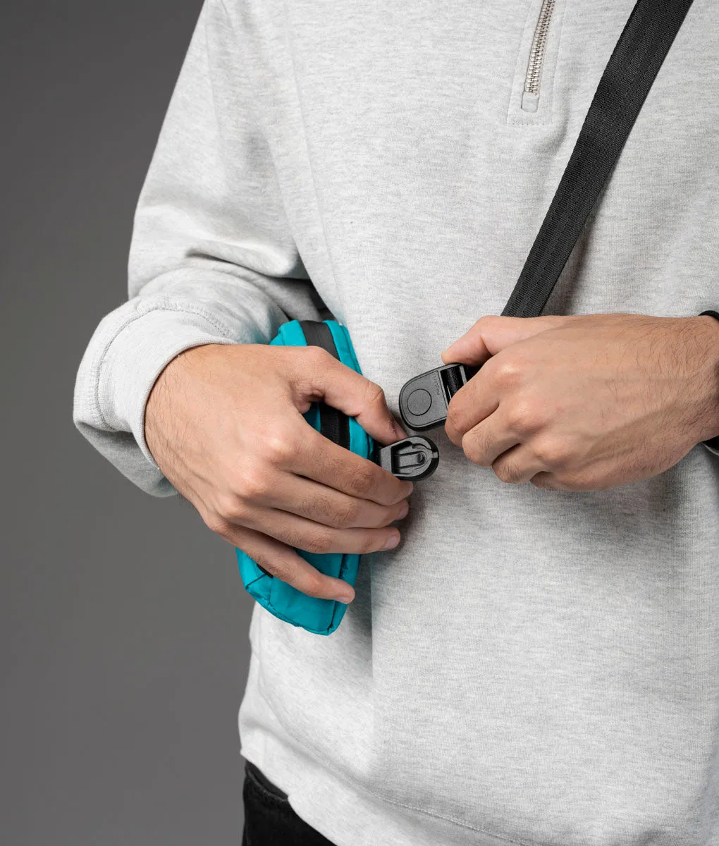 Alpaka Flight Sling skuldertaske 1L teal