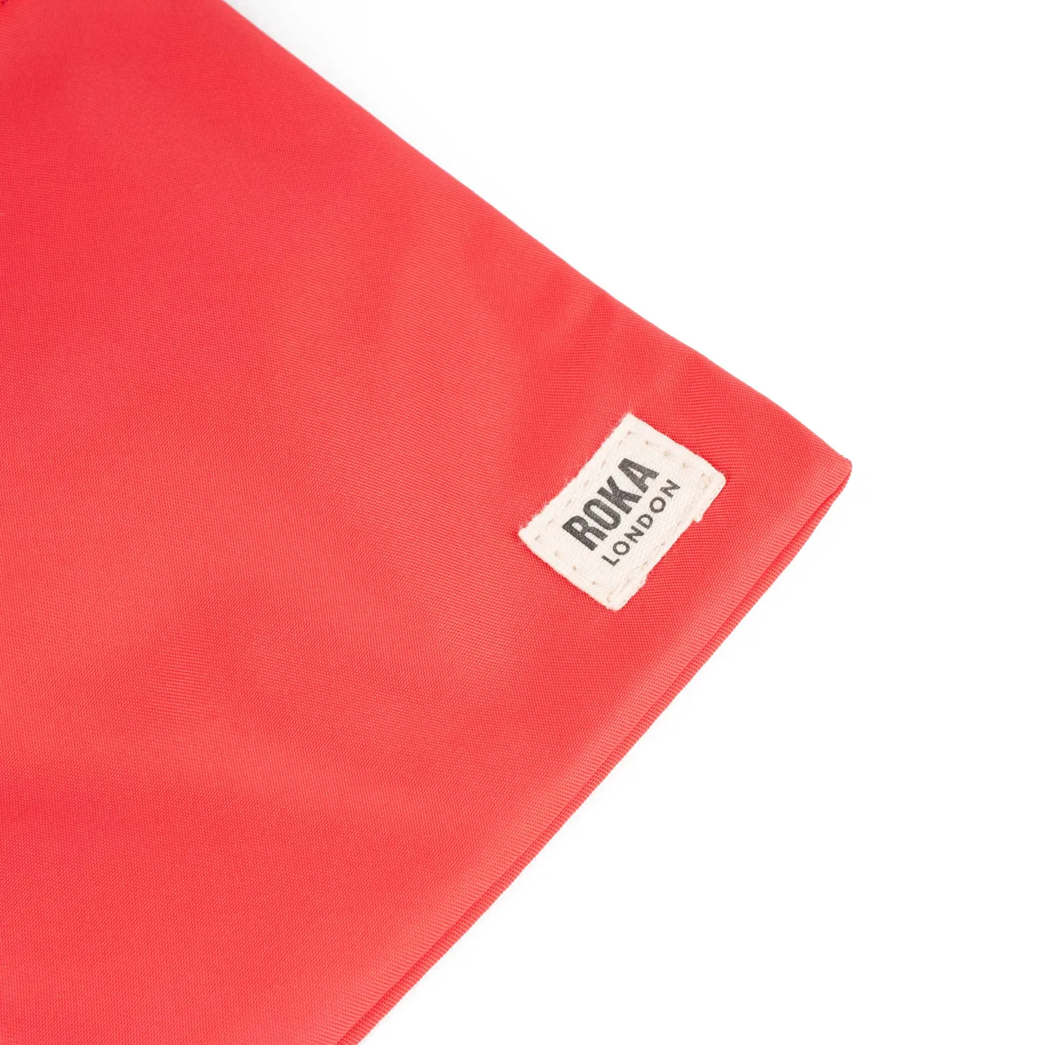 Roka London Chelsea Pocket Sling skuldertaske Poppy XS vejrbestandig