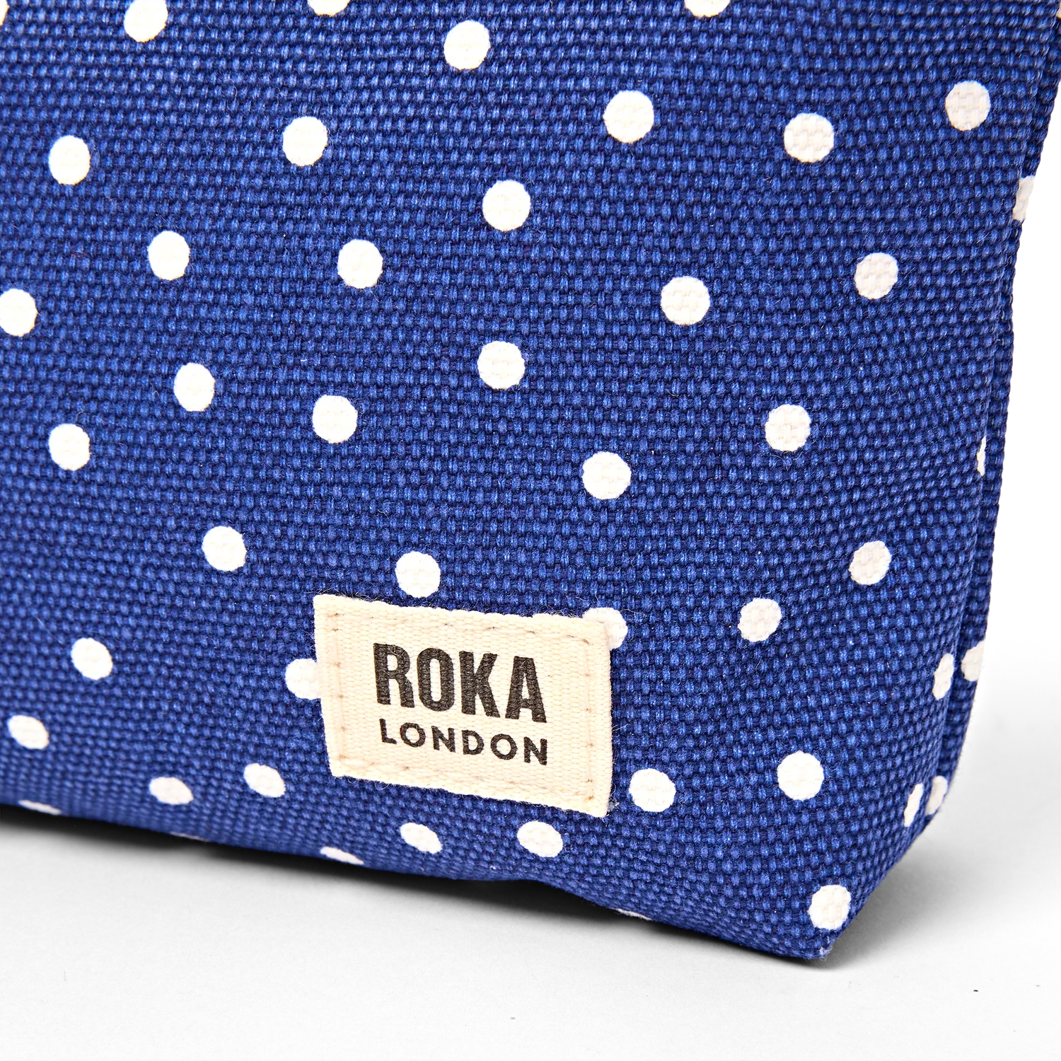Roka London Maida Vale pouch Navy Polka Small 1,2 liter