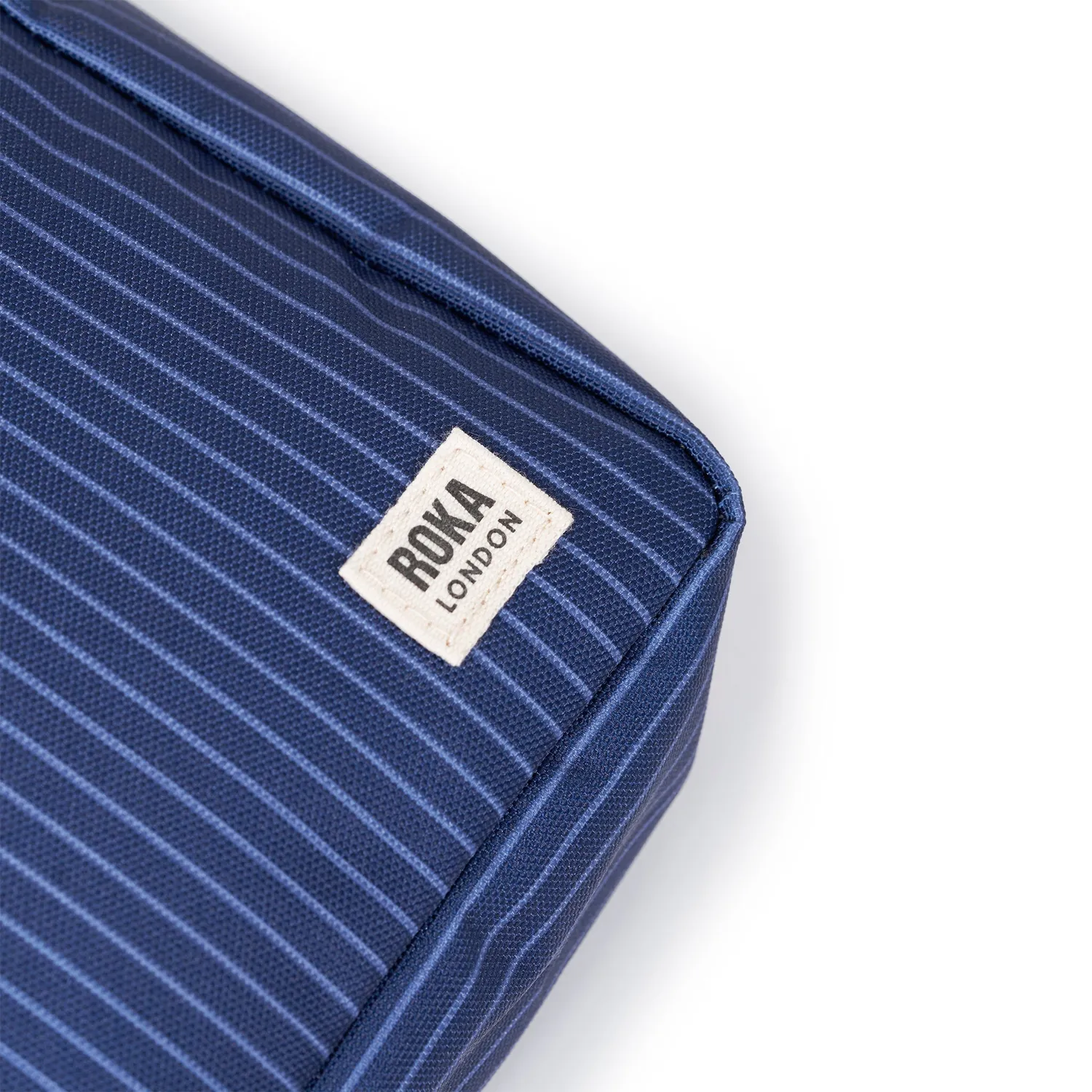 Roka London Bond crossbody dark denim pin stripe small