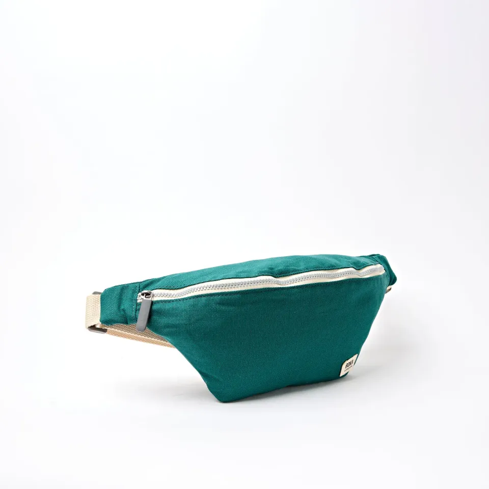 Roka London Mill Hill Small bæltetaske teal vandafvisende
