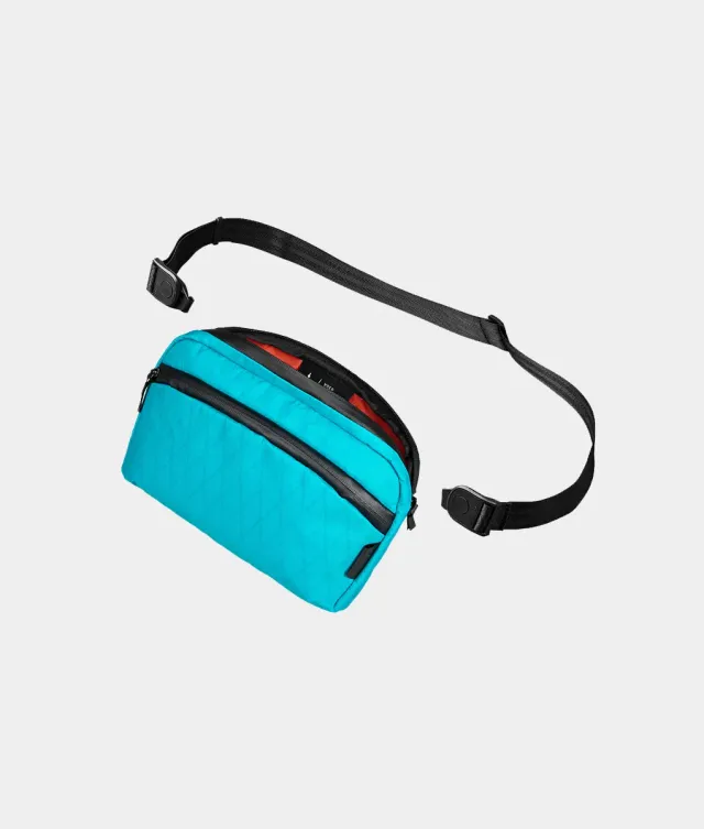 Alpaka Flight Sling skuldertaske 1L teal