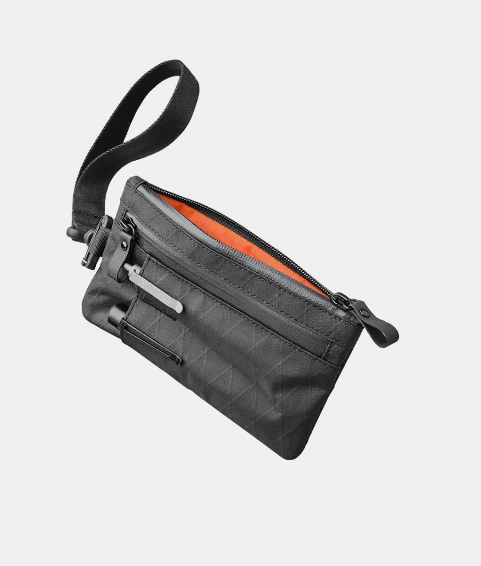 Alpaka Zip Clutch organizer med håndrem