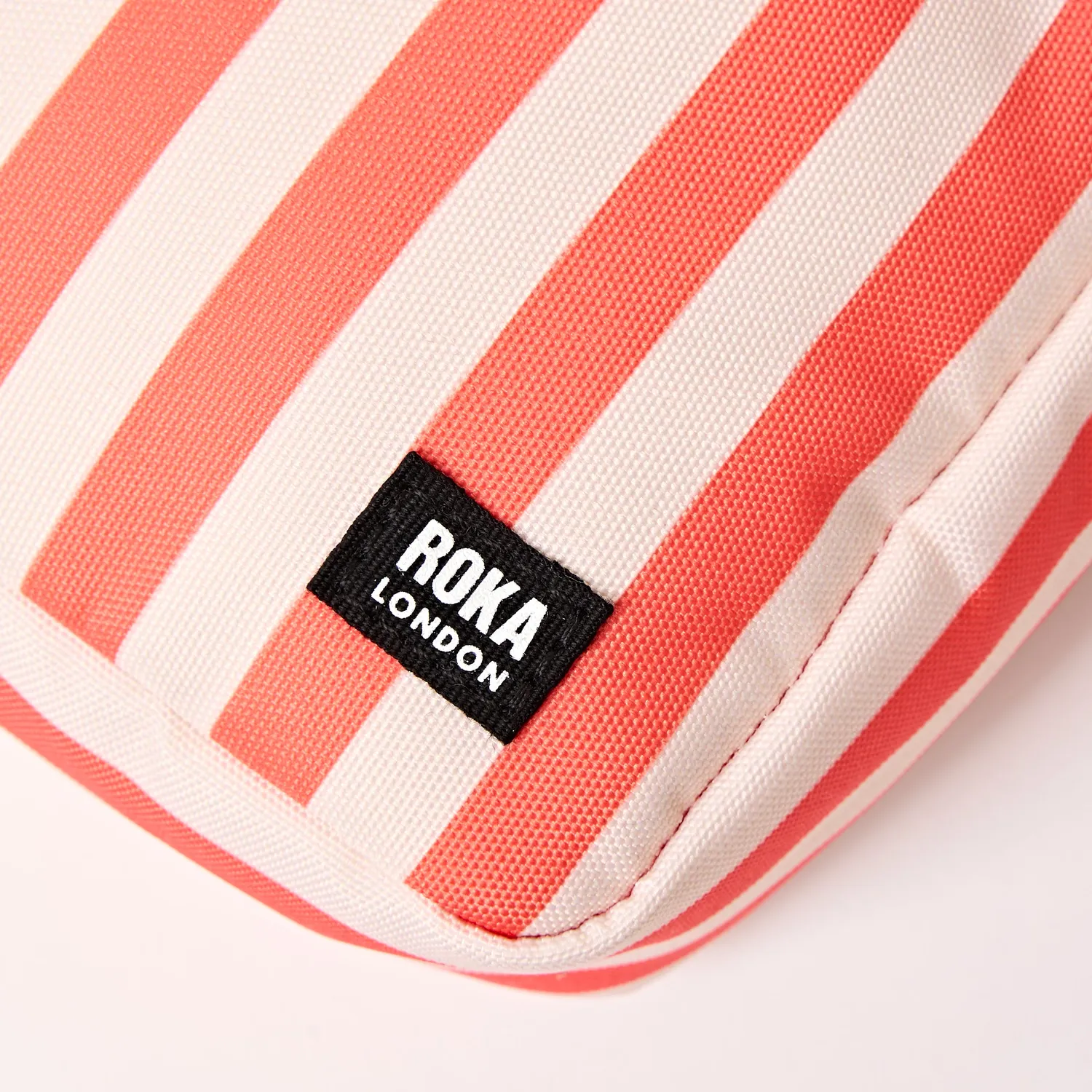 Roka Bond minitaske Coral Stripe S foret