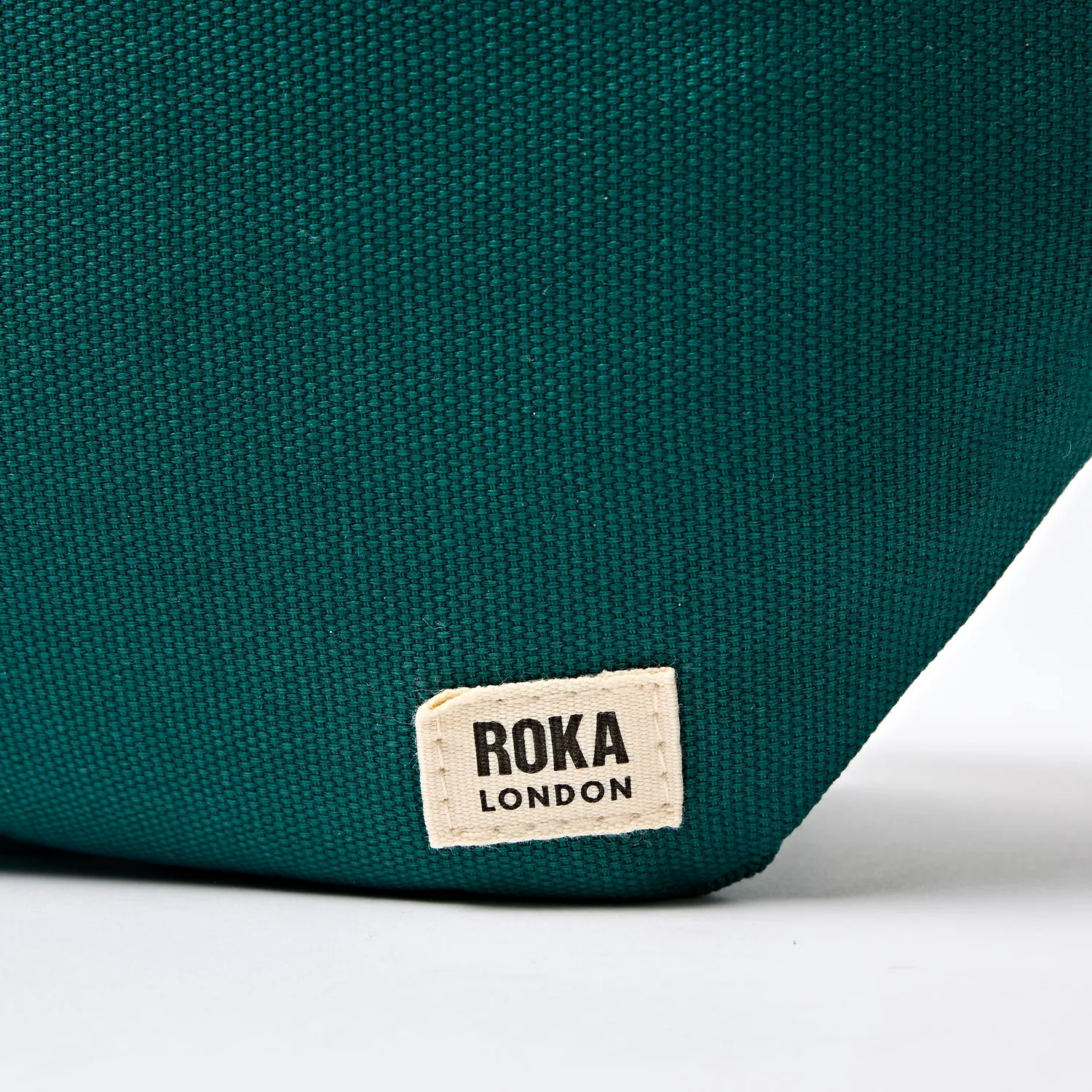 Roka London Mill Hill Small bæltetaske teal vandafvisende