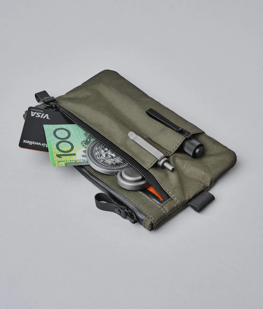 Alpaka Zip Clutch organizer med håndrem