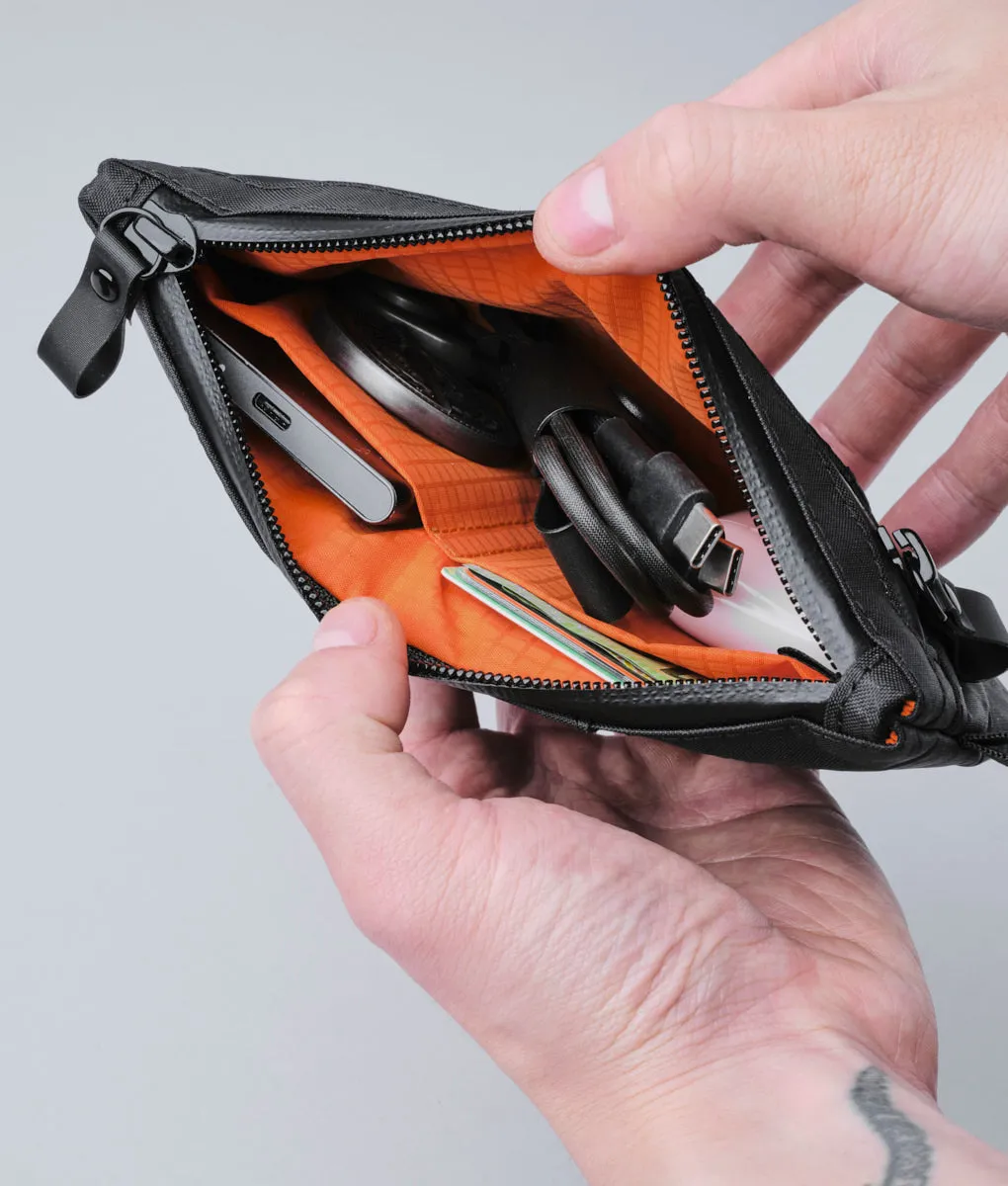 Alpaka Zip Clutch organizer med håndrem