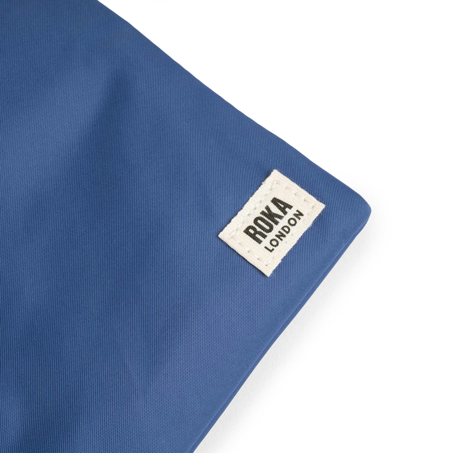 Roka London Chelsea sling taske burnt blue ekstra lille