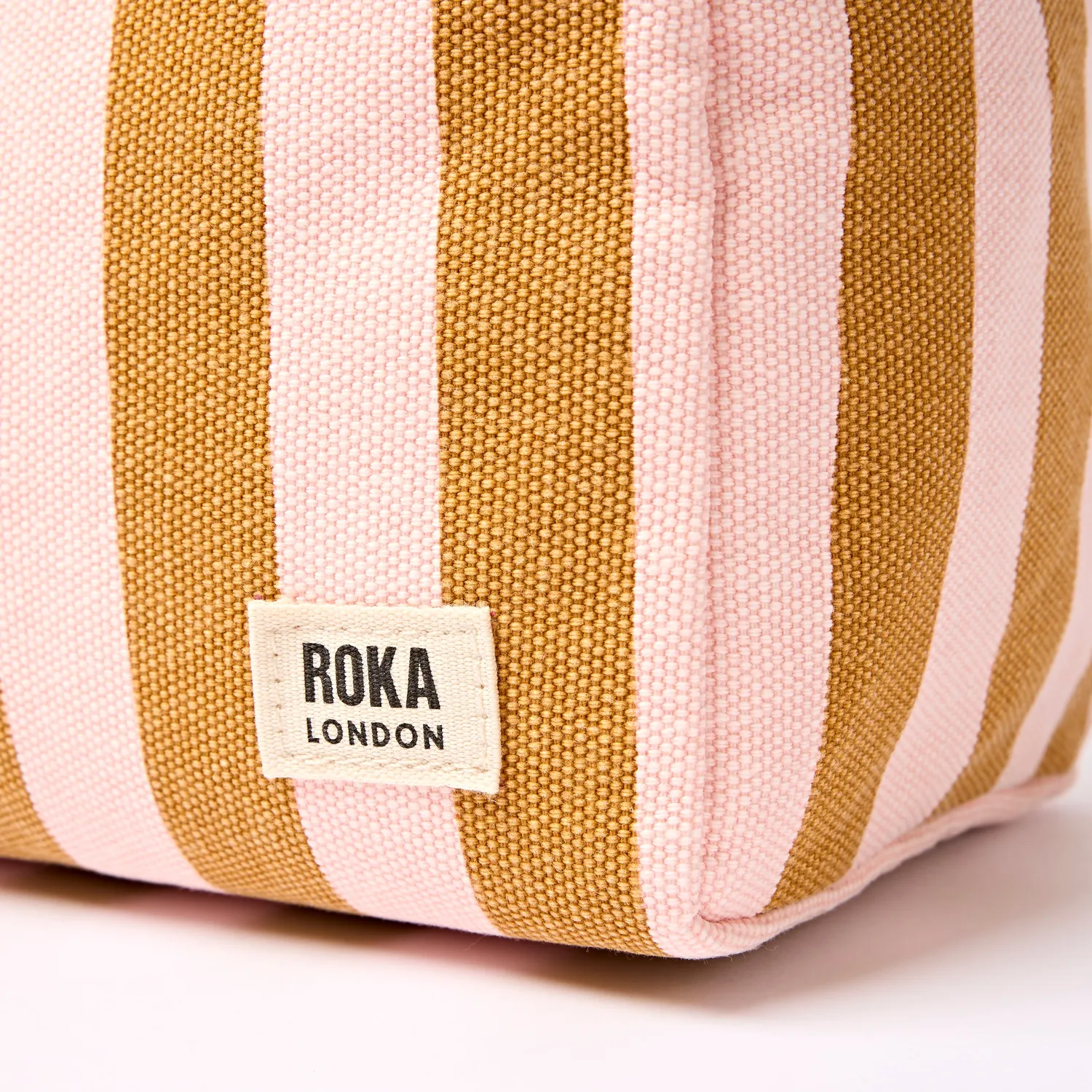 Roka London Maygrove toilettaske Rose Gold Stripe Small vandtæt