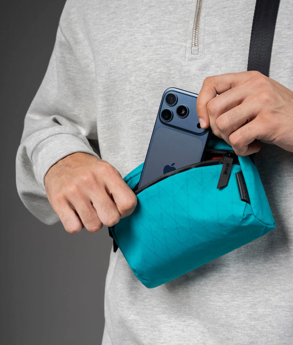 Alpaka Flight Sling skuldertaske 1L teal