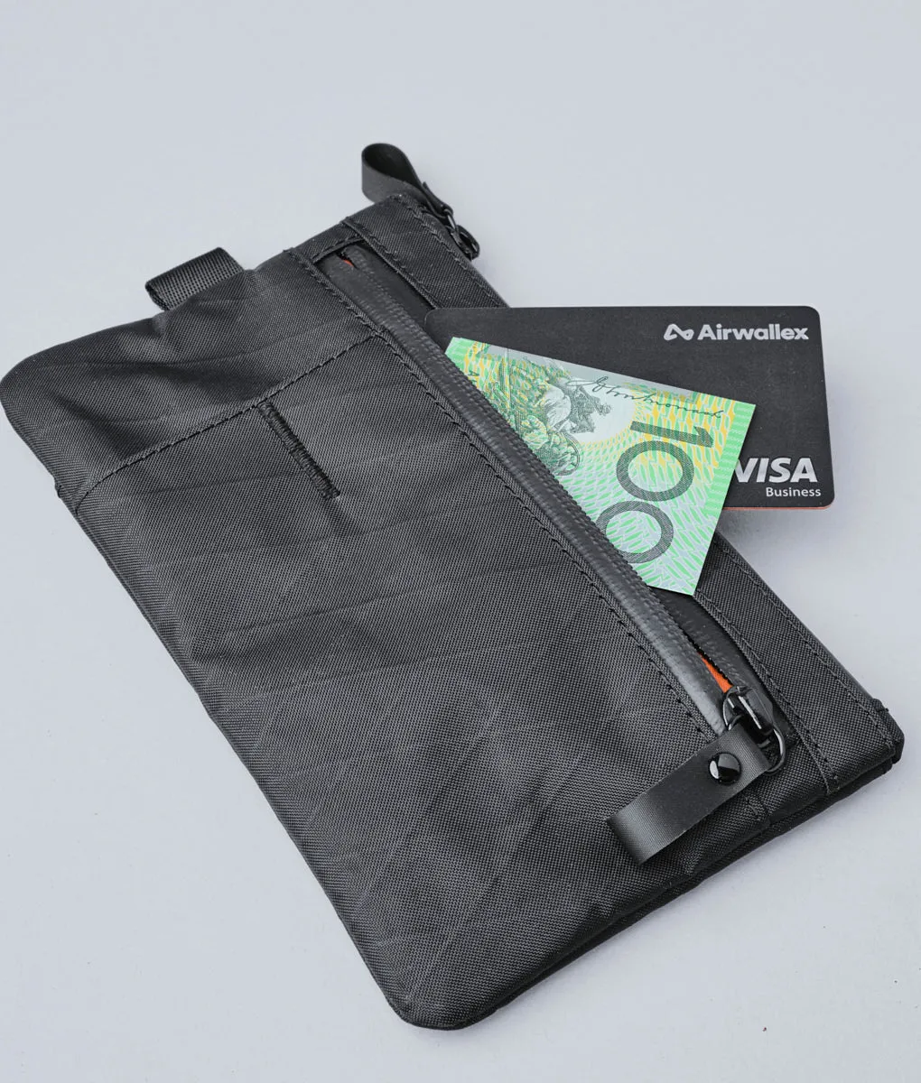 Alpaka Zip Clutch organizer med håndrem