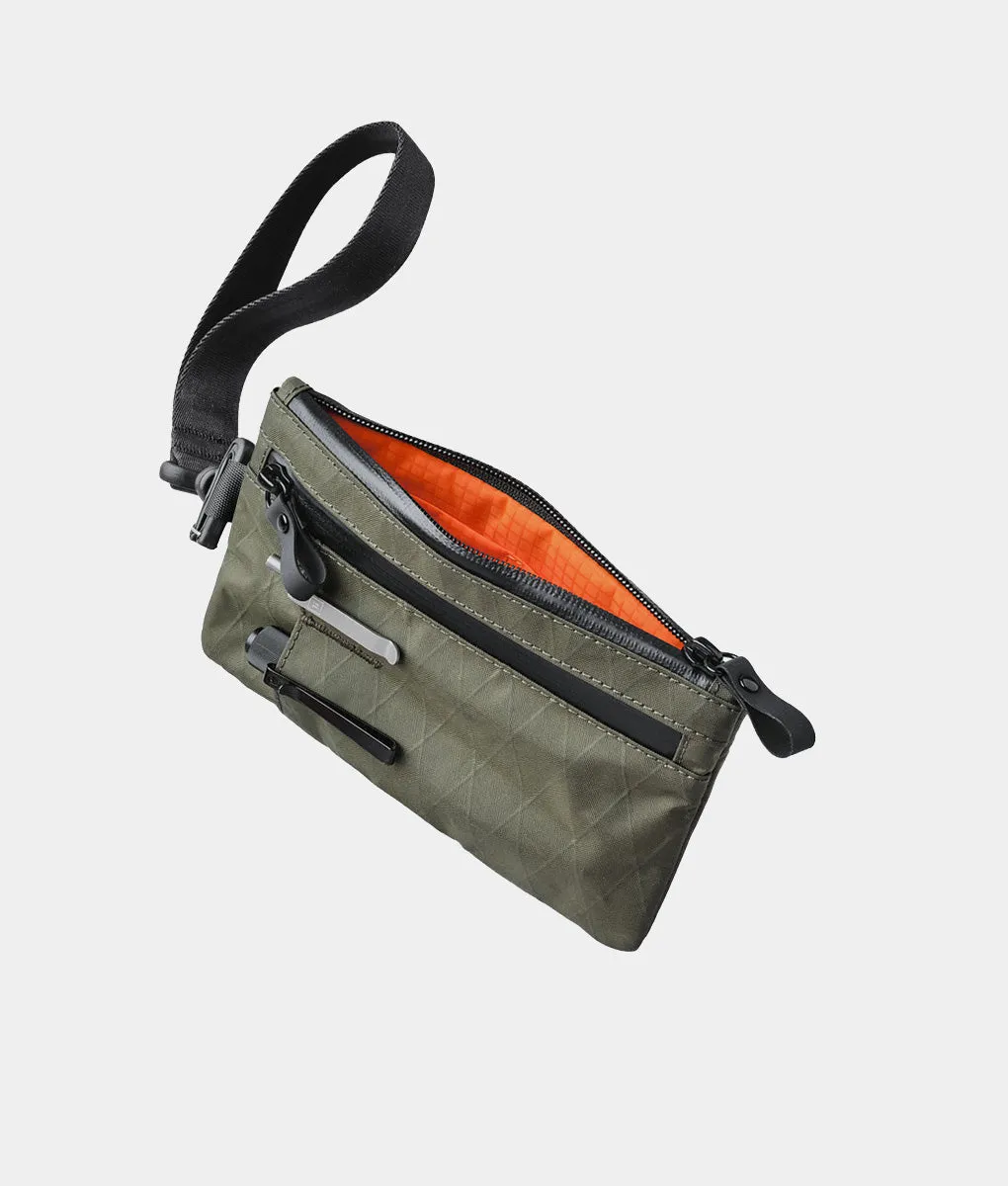 Alpaka Zip Clutch organizer med håndrem