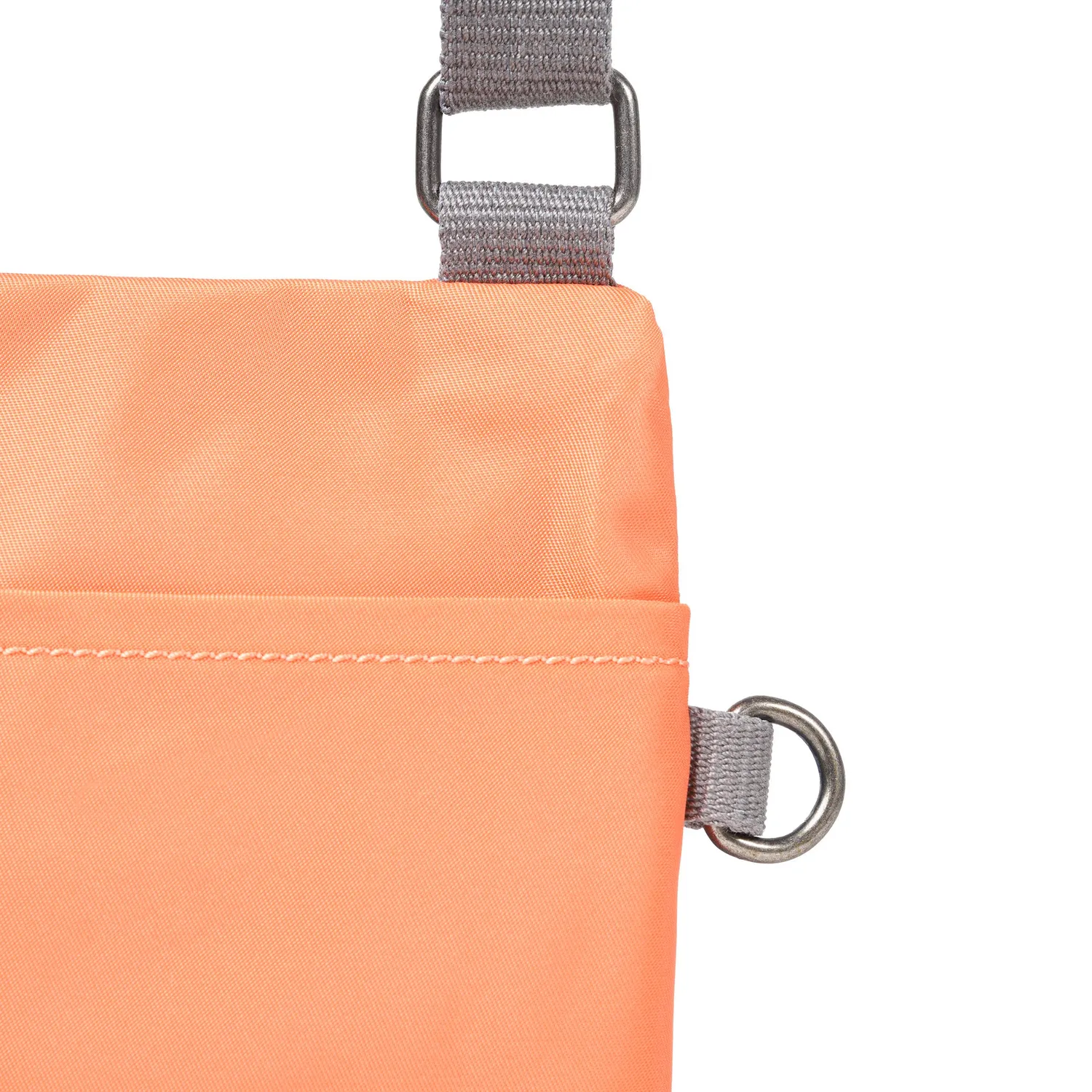 Roka London Chelsea XS sling taske Firecracker vandafvisende