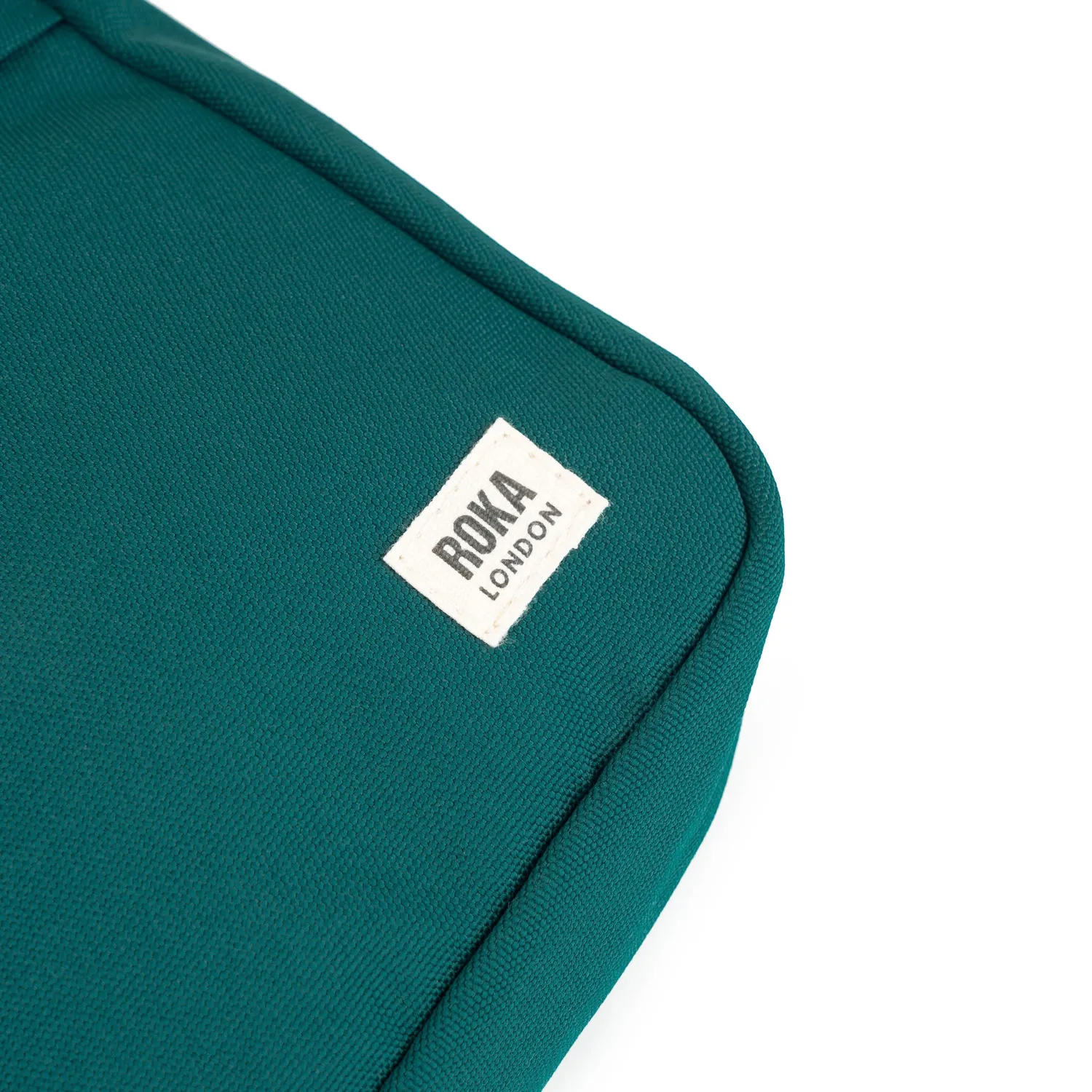 Roka London Bond crossbody taske teal small vejrbestandig